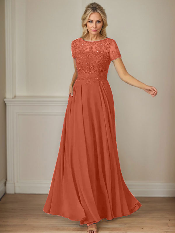 Robe en mousseline de soie bleu marine foncé, coupe trapèze, col bateau et sequins 
