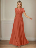 Robe en mousseline de soie bleu marine foncé, coupe trapèze, col bateau et sequins 