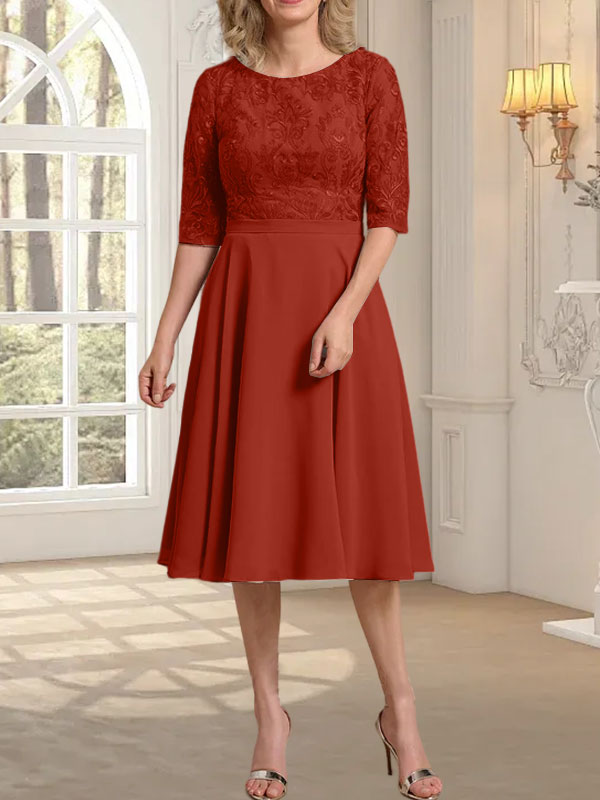 Vestido de novia de gasa de encaje, corte en A, escote redondo y largo hasta la rodilla.