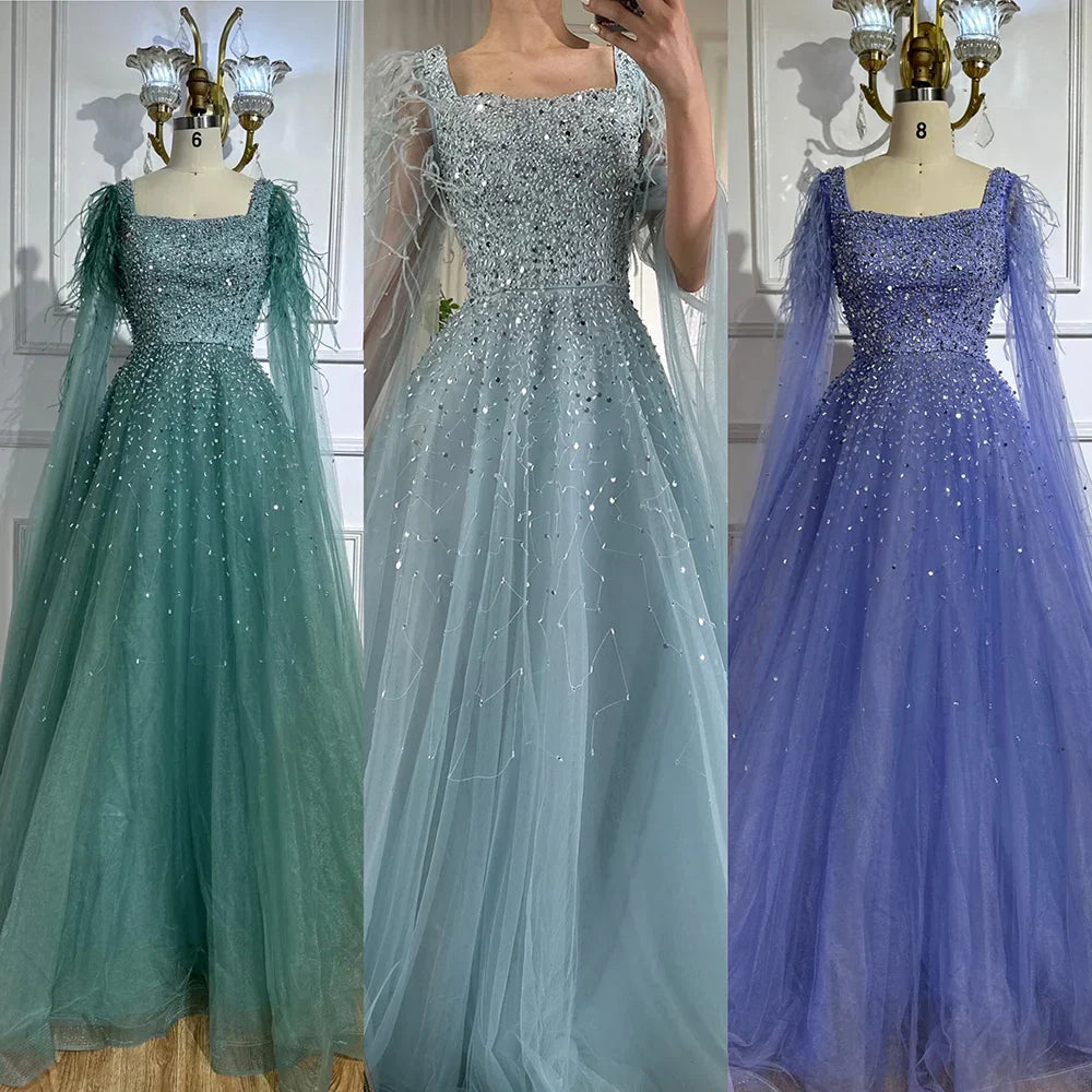 Vestido de noche de lujo saudí, corte A, estilo árabe, con plumas, mangas tipo capa y cuentas. Ideal para ocasiones formales. Modelo LA71782A (2025). 