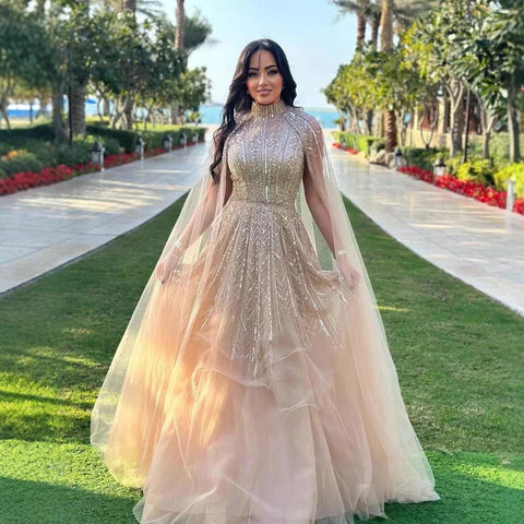 Robe de soirée trapèze bleue à perles et manches cape LA72728