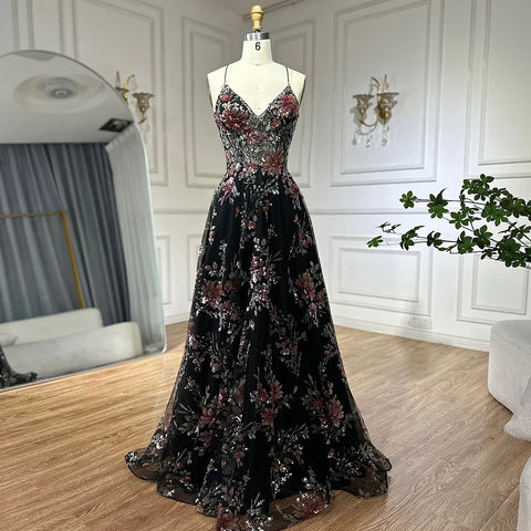 Vestido de fiesta de lujo negro con tirantes finos, corte en A y cuentas, modelo LA72773, para ocasiones formales (2025). 