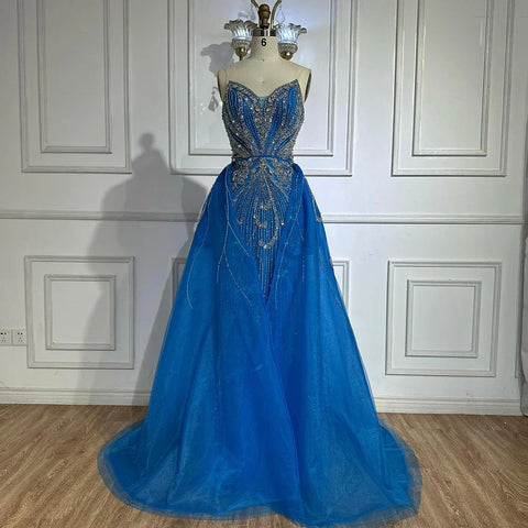 Vestido de noche corte sirena sin tirantes color turquesa, estilo saudí, con sobrefalda para ocasiones formales LA72880 (modelo 2025) 