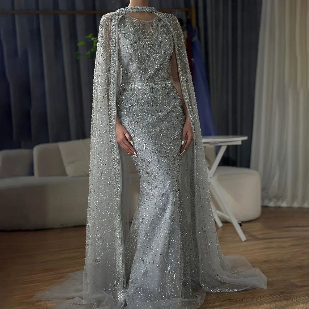 Vestido de noche de sirena árabe gris de lujo de Dubái 2025 con cuentas y capa larga desmontable para fiestas de mujer LA72180 