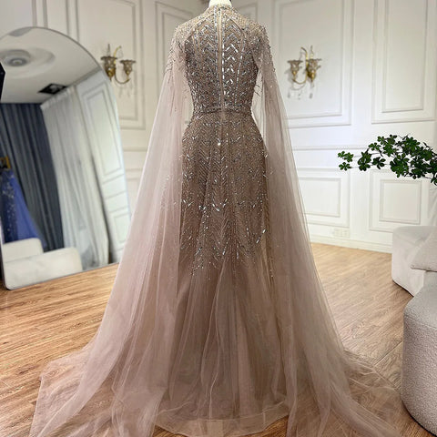 Robe de soirée trapèze bleue à perles et manches cape LA72728