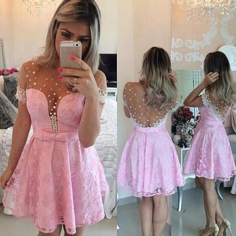 Robe de bal rose mignonne en tulle, coupe trapèze, col rond et manches