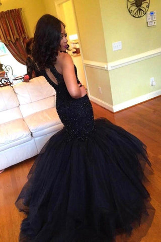 Robe de bal longue sirène sans manches en tulle bleu marine, dos nu, ornée de perles 