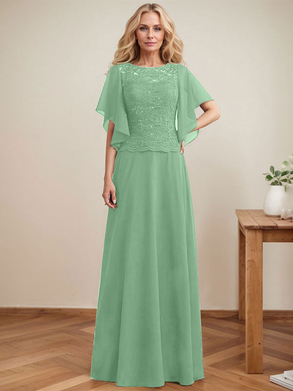 Vestido de novia de corte A, escote redondo, ilusión, largo hasta el suelo, de encaje y gasa con lentejuelas. 