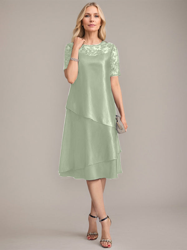 Vestido de corte A, escote redondo, largo hasta la rodilla, para la madre de la novia, con apliques y lentejuelas. 