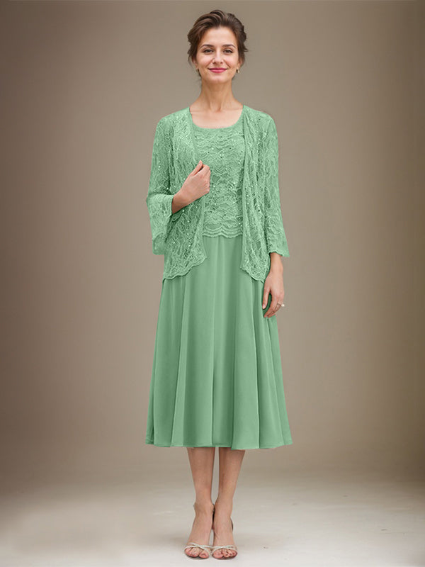 Vestido de novia de corte línea A, escote redondo, largo hasta la rodilla, de encaje y gasa con lentejuelas. 