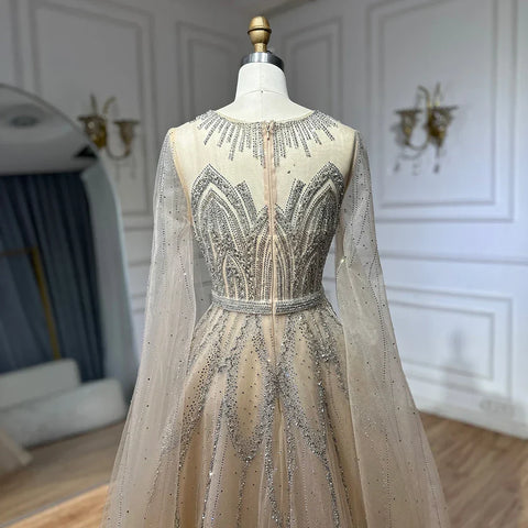 Robe de soirée longue arabe élégante bleu nude, coupe trapèze, perlée, avec manches cape, pour une occasion formelle, LA72785, 2025 