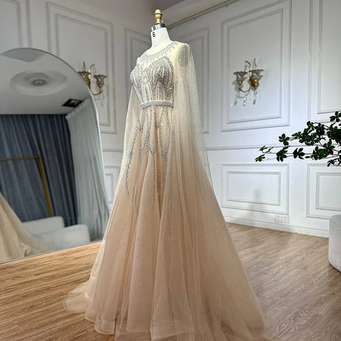 Robe de soirée longue arabe élégante bleu nude, coupe trapèze, perlée, avec manches cape, pour une occasion formelle, LA72785, 2025 