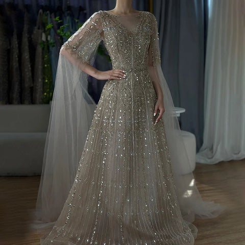 Vestido de noche azul de lujo con mangas tipo capa LA72666