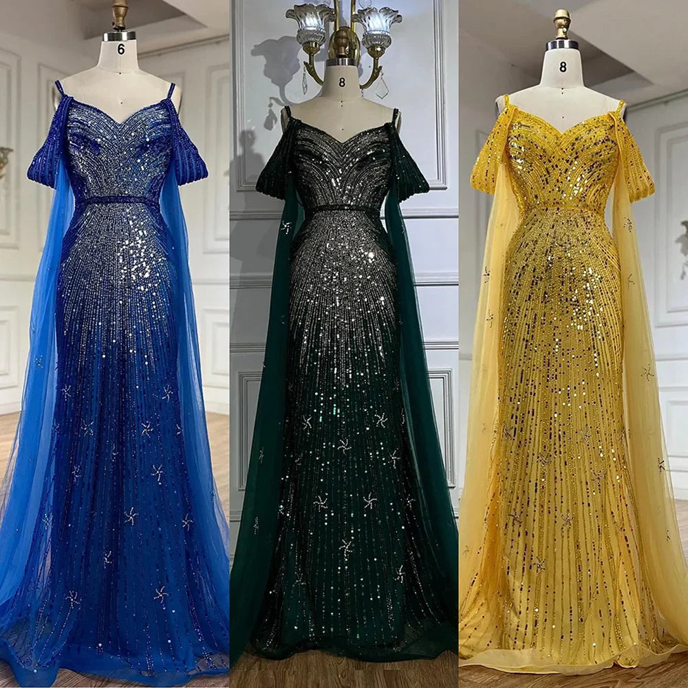 Vestido de noche de lujo estilo sirena azul con tirantes finos y mangas tipo capa, ideal para ocasiones formales (modelo 2025). Fabricado en Arabia Saudita (LA72707). 