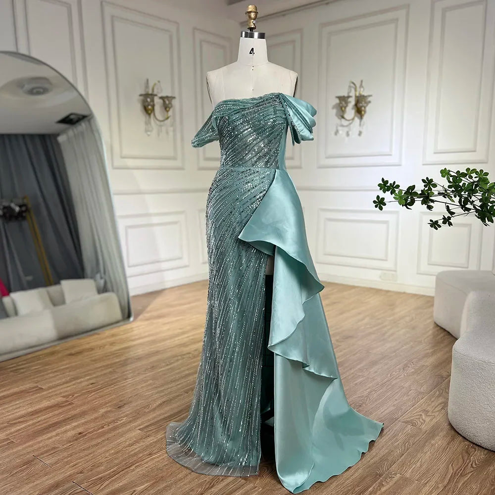 Vestido de noche largo de lujo con sobrefalda de sirena verde árabe 2025, con cuentas y abertura, para mujer, ideal para bodas y fiestas (LA72633) 