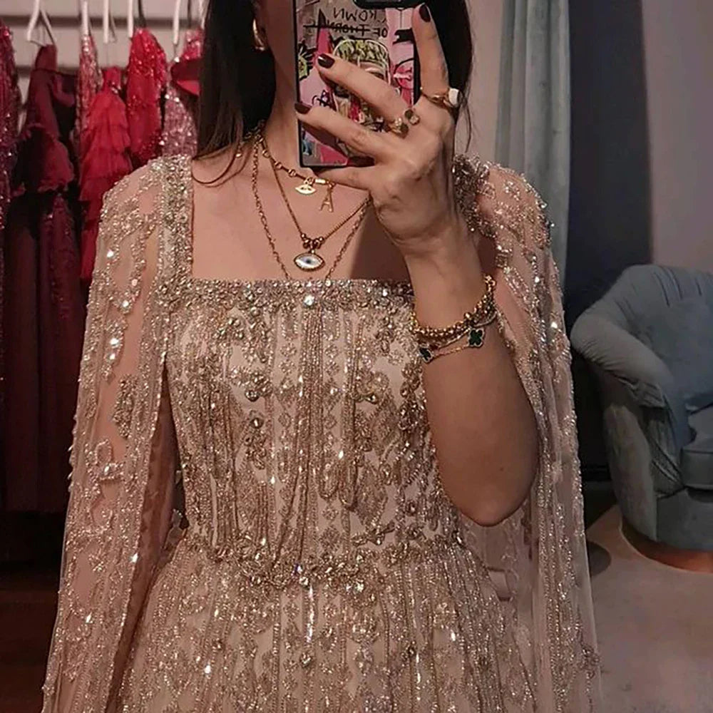Vestido de noche de lujo saudí LA72764, corte A, manga capa, con cuentas de cristal, estilo árabe, color nude, ideal para ocasiones formales (modelo 2025).
