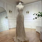 2025 Arabic Nude Halter Neck Mermaid Pearls Beaded Luxury Dubai Evening Gown for Women's Party LA72696