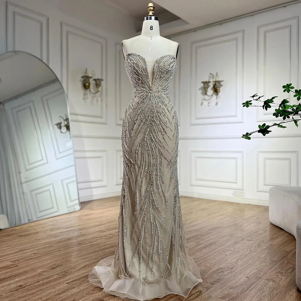 Vestido de noche de lujo estilo sirena con perlas y cuello halter color nude árabe, modelo LA72696, para mujer.