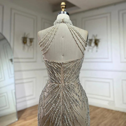 Vestido de noche de lujo estilo sirena con perlas y cuello halter color nude árabe, modelo LA72696, para mujer.