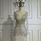 Vestido de noche de lujo estilo sirena blanco árabe de Dubái 2025 con plumas y cuentas para fiesta de mujer LA72646 