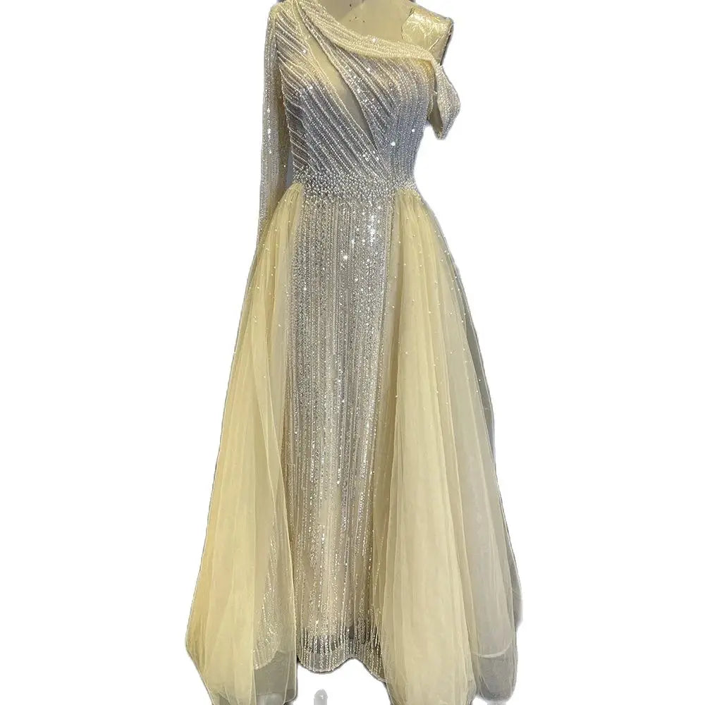Vestido de noche de lujo negro de un solo hombro con sobrefalda y cuentas, ideal para ocasiones formales y fiestas (modelo LA72424A). 