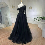 Vestido de noche de lujo negro de un solo hombro con sobrefalda y cuentas, ideal para ocasiones formales y fiestas (modelo LA72424A). 