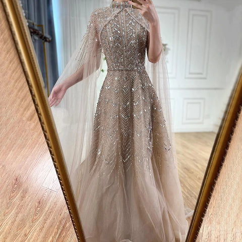 Robe de soirée trapèze bleue à perles et manches cape LA72728