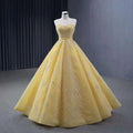 Vestido de novia de lujo personalizado de alta gama, amarillo, sin tirantes, con encaje y cuentas, modelo HM231017 