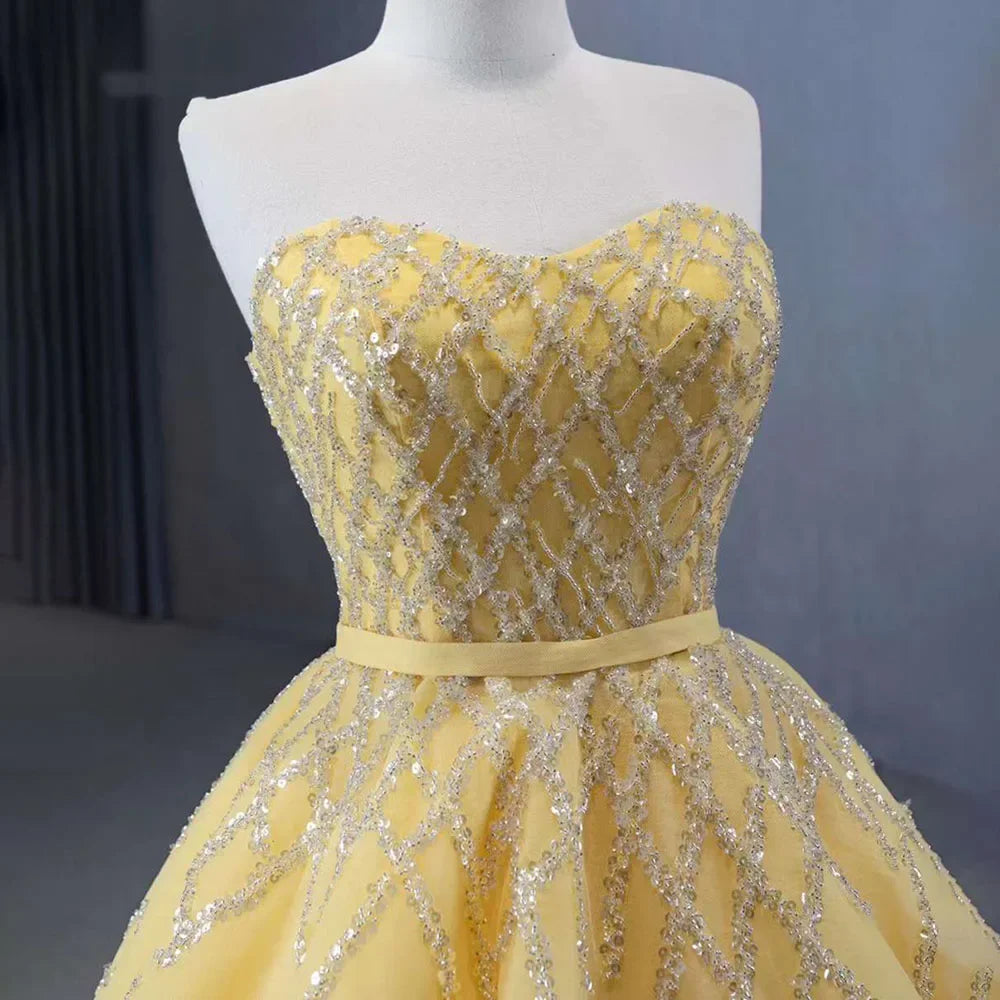 Vestido de novia de lujo personalizado de alta gama, amarillo, sin tirantes, con encaje y cuentas, modelo HM231017 