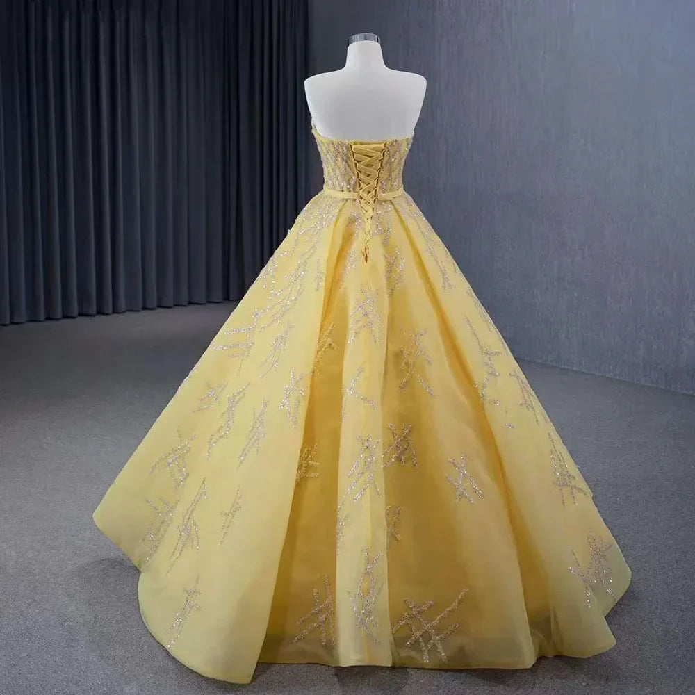 Vestido de novia de lujo personalizado de alta gama, amarillo, sin tirantes, con encaje y cuentas, modelo HM231017 