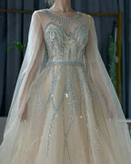 Vestido largo de noche árabe elegante, corte en A, con cuentas, color azul nude, mangas tipo capa, ideal para ocasiones formales (LA72785) 