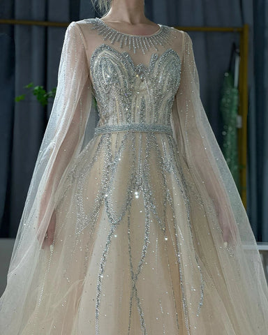 Robe de soirée longue arabe élégante bleu nude, coupe trapèze, perlée, avec manches cape, pour une occasion formelle, LA72785, 2025 