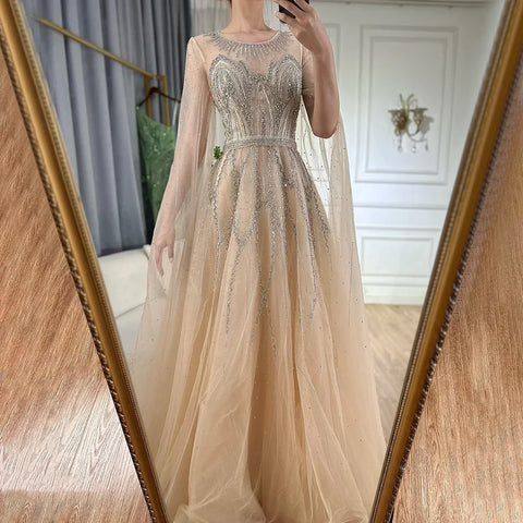 Robe de soirée longue arabe élégante bleu nude, coupe trapèze, perlée, avec manches cape, pour une occasion formelle, LA72785, 2025 
