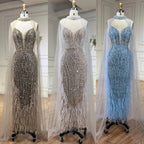 Vestidos de fiesta de boda estilo sirena color blanco nude con plumas y mangas tipo capa de lujo (modelo LA72047A) 