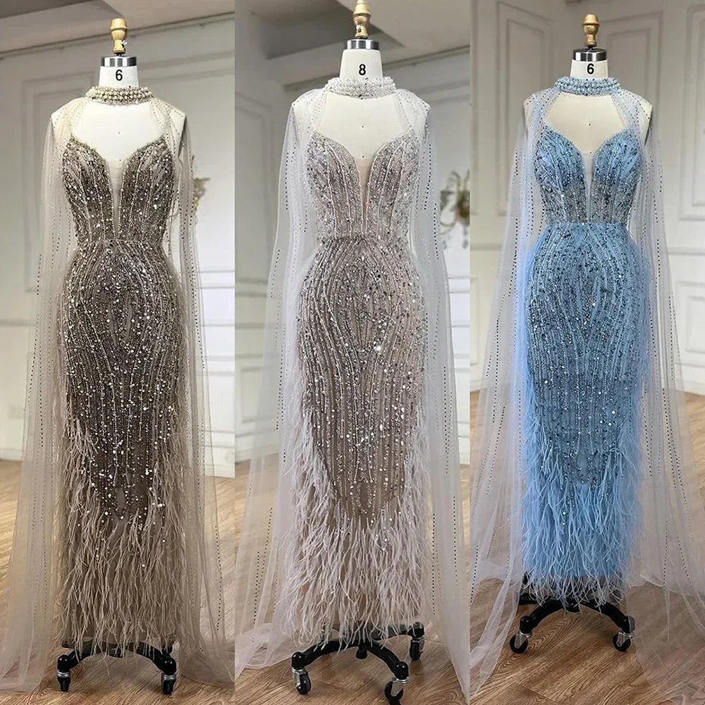 Vestidos de fiesta de boda estilo sirena color blanco nude con plumas y mangas tipo capa de lujo (modelo LA72047A) 
