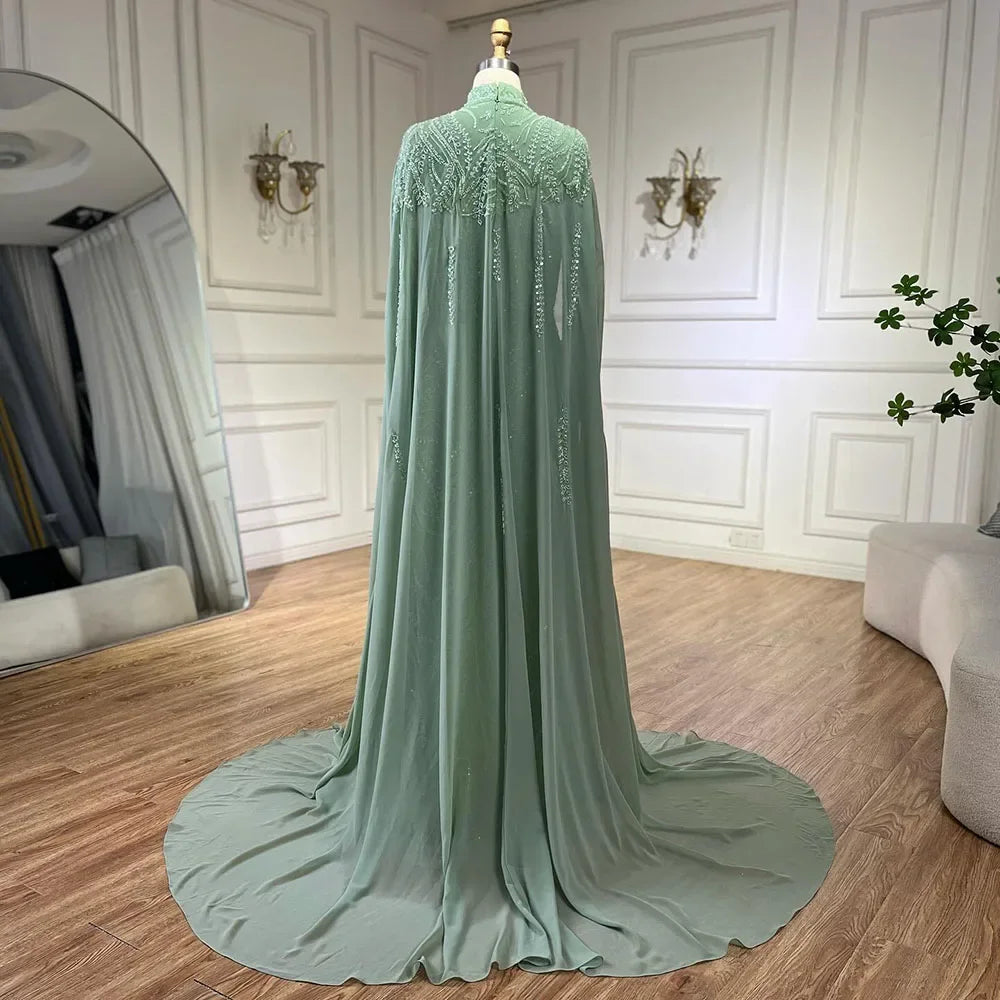 Vestido de noche de lujo para mujer, estilo sirena, color verde salvia, con mangas tipo capa y cuentas, de satén, modelo LA72413 (2025) 