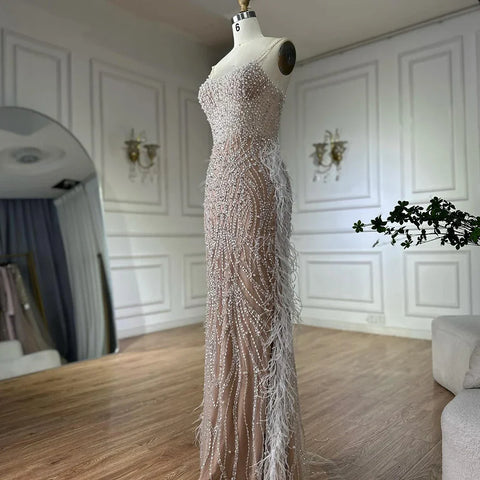 2025 Arabic White Nude Spaghetti Strap Feathers Beaded Mermaid Evening Gown for Formal Occasion LA72823