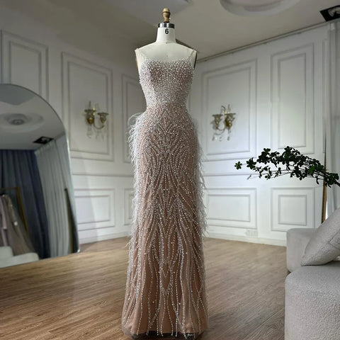 2025 Arabic White Nude Spaghetti Strap Feathers Beaded Mermaid Evening Gown for Formal Occasion LA72823