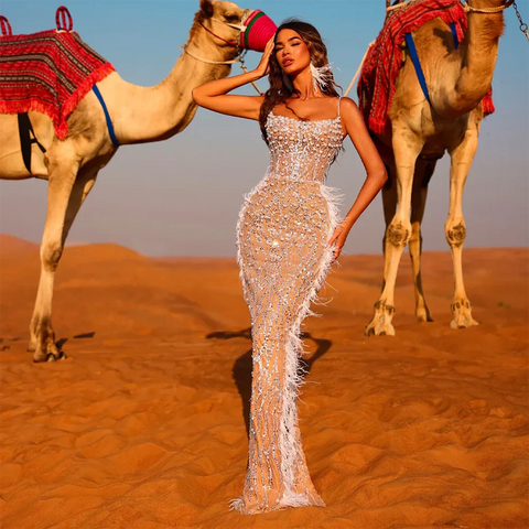 2025 Arabic White Nude Spaghetti Strap Feathers Beaded Mermaid Evening Gown for Formal Occasion LA72823