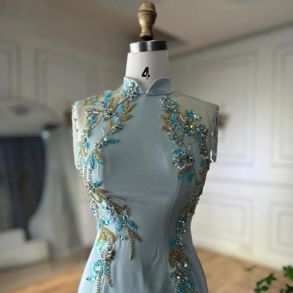 Vestido de noche de satén con borlas y cuentas estilo sirena, modelo LA72797B de Saudi Mint (2025). Ideal para ocasiones formales. 