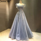 Vestidos de noche de tul azul corte A, estilo sexy, con flores y pedrería, colección 2025, para mujer, ideales para fiestas (LA71149) 
