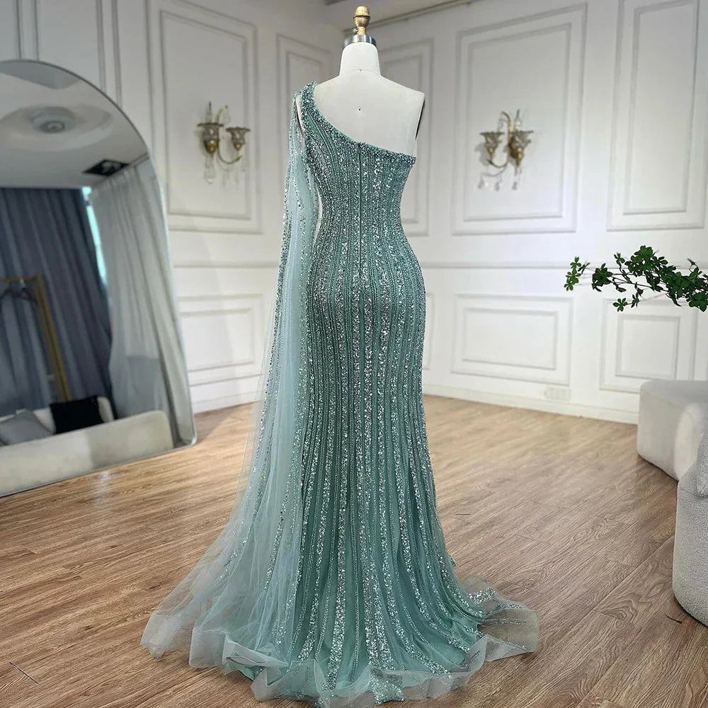 Vestido de noche estilo sirena turquesa con mangas tipo capa, un solo hombro y cuentas árabes, para mujer, ideal para bodas y fiestas (2025) LA72284 