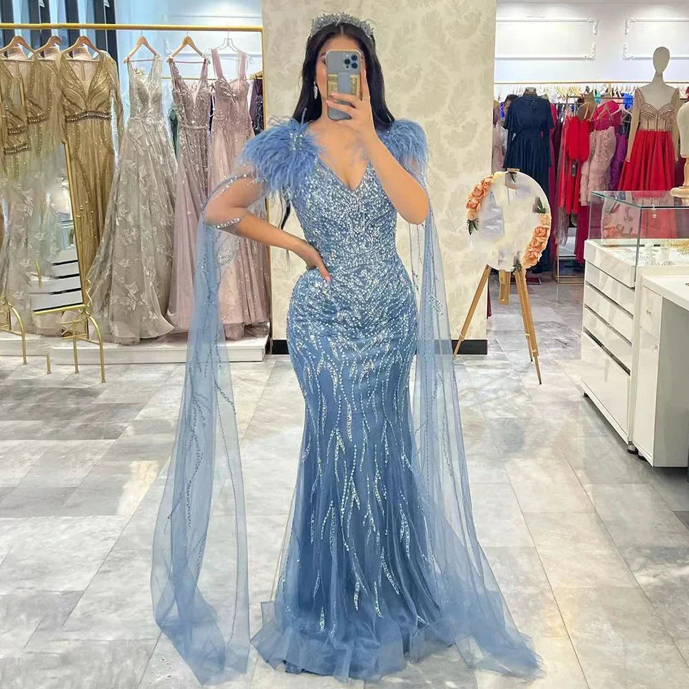 Vestidos de noche elegantes de sirena azul árabe con mangas de capa, plumas y cuentas de lujo para mujer, estilo fiesta, colección 2025, LA71780 