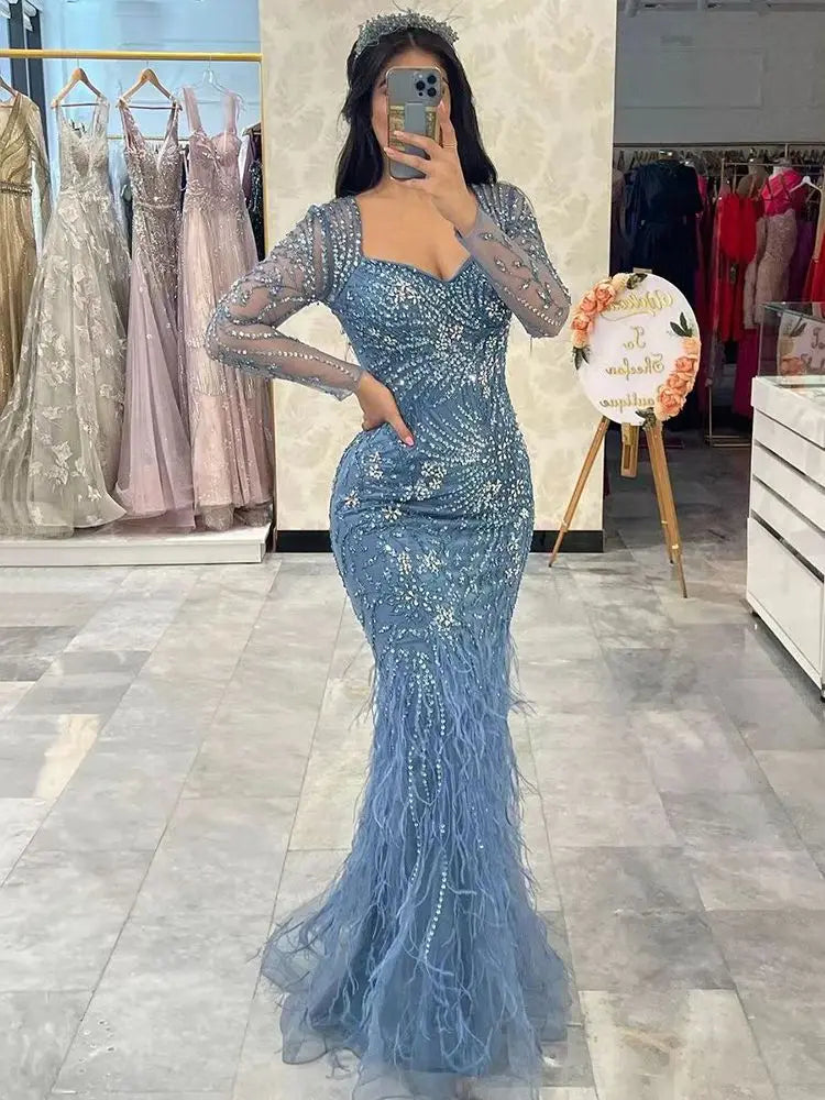 Vestidos de noche elegantes de sirena azul árabe con plumas y cuentas para mujer, ideales para fiestas 2025 LA71818 