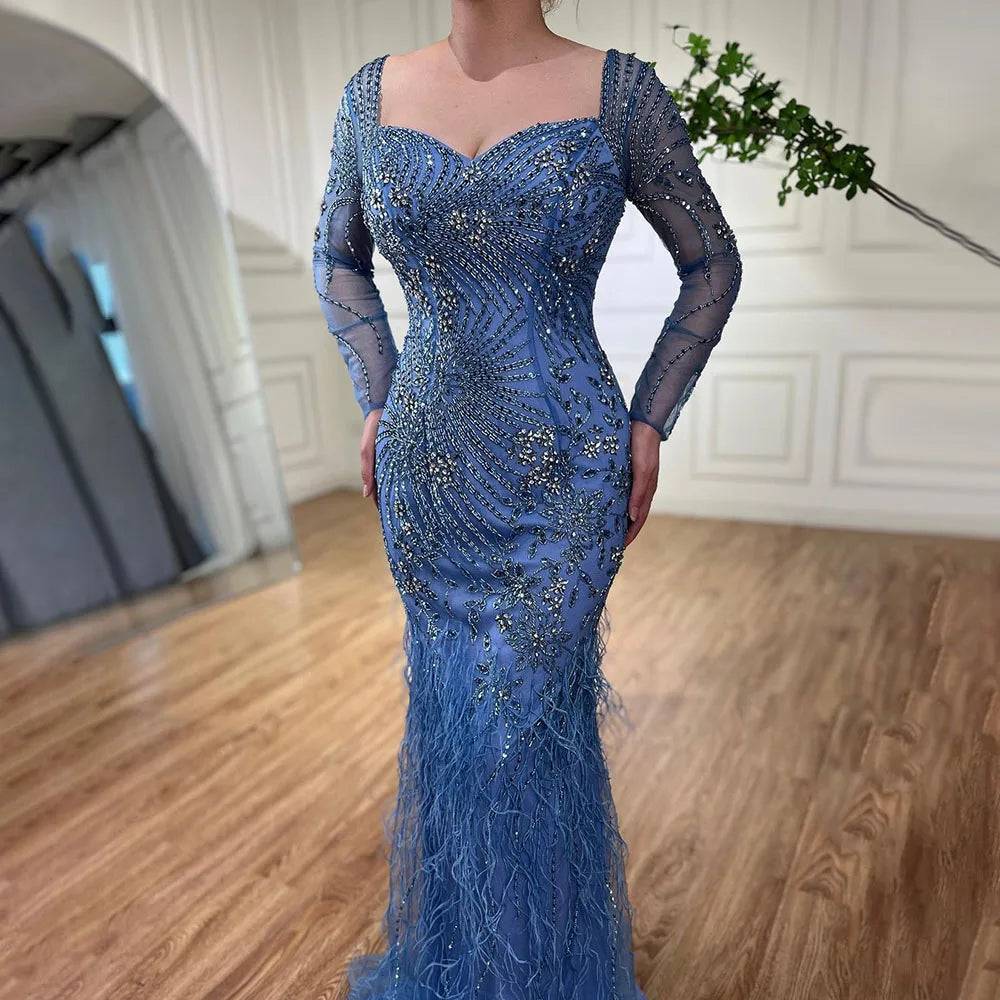 Vestidos de noche elegantes de sirena azul árabe con plumas y cuentas para mujer, ideales para fiestas 2025 LA71818 