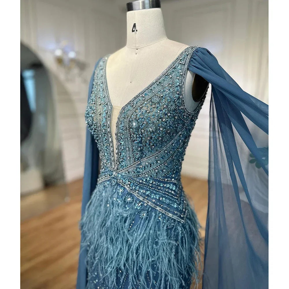 Vestido de noche elegante estilo sirena azul árabe con capa, lujoso, con cuentas y plumas, estilo Dubái, para mujer, ideal para fiestas (LA71583B). 