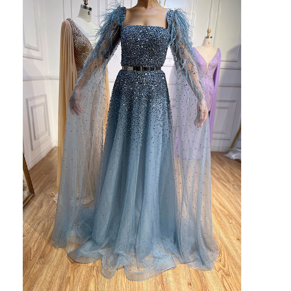 Vestidos de noche de lujo para mujer, estilo árabe, dorado, corte en A, con plumas, mangas tipo capa y cuentas, para fiestas, colección 2025 LA71782 