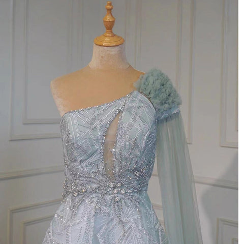 Robe de soirée sexy style arabe turquoise, coupe trapèze, asymétrique, manches cape, perles, luxueuse, 2025, LA71741 