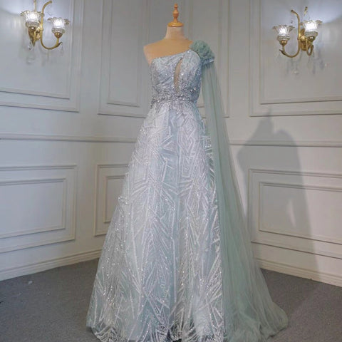 Robe de soirée sexy style arabe turquoise, coupe trapèze, asymétrique, manches cape, perles, luxueuse, 2025, LA71741 