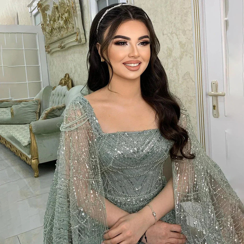 Robe de soirée longue en dentelle turquoise pour femme, manches cape, perles et perles, 2025 LA72590 